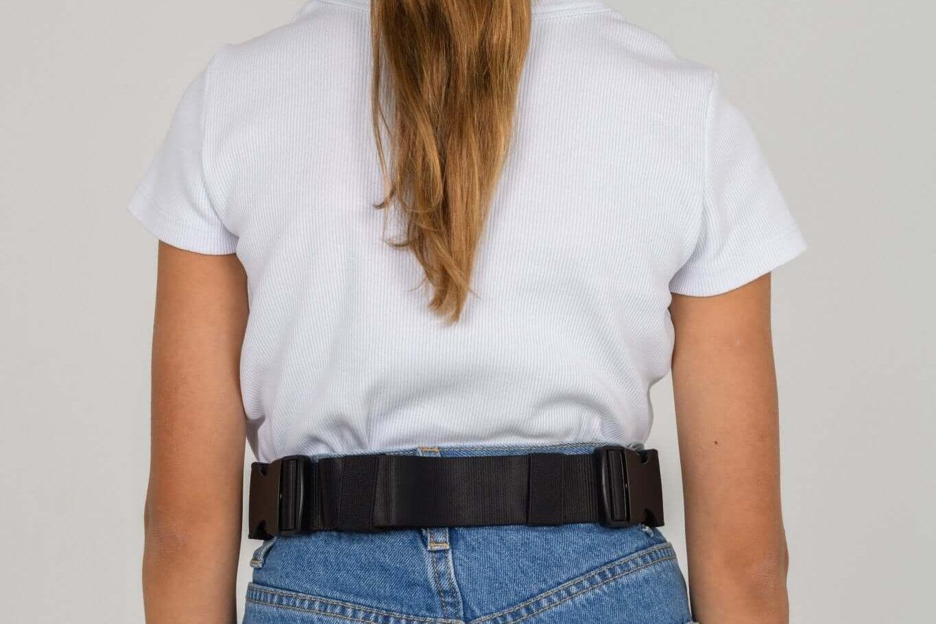 Black Med Ready Bag worn as a waist bag - back view.