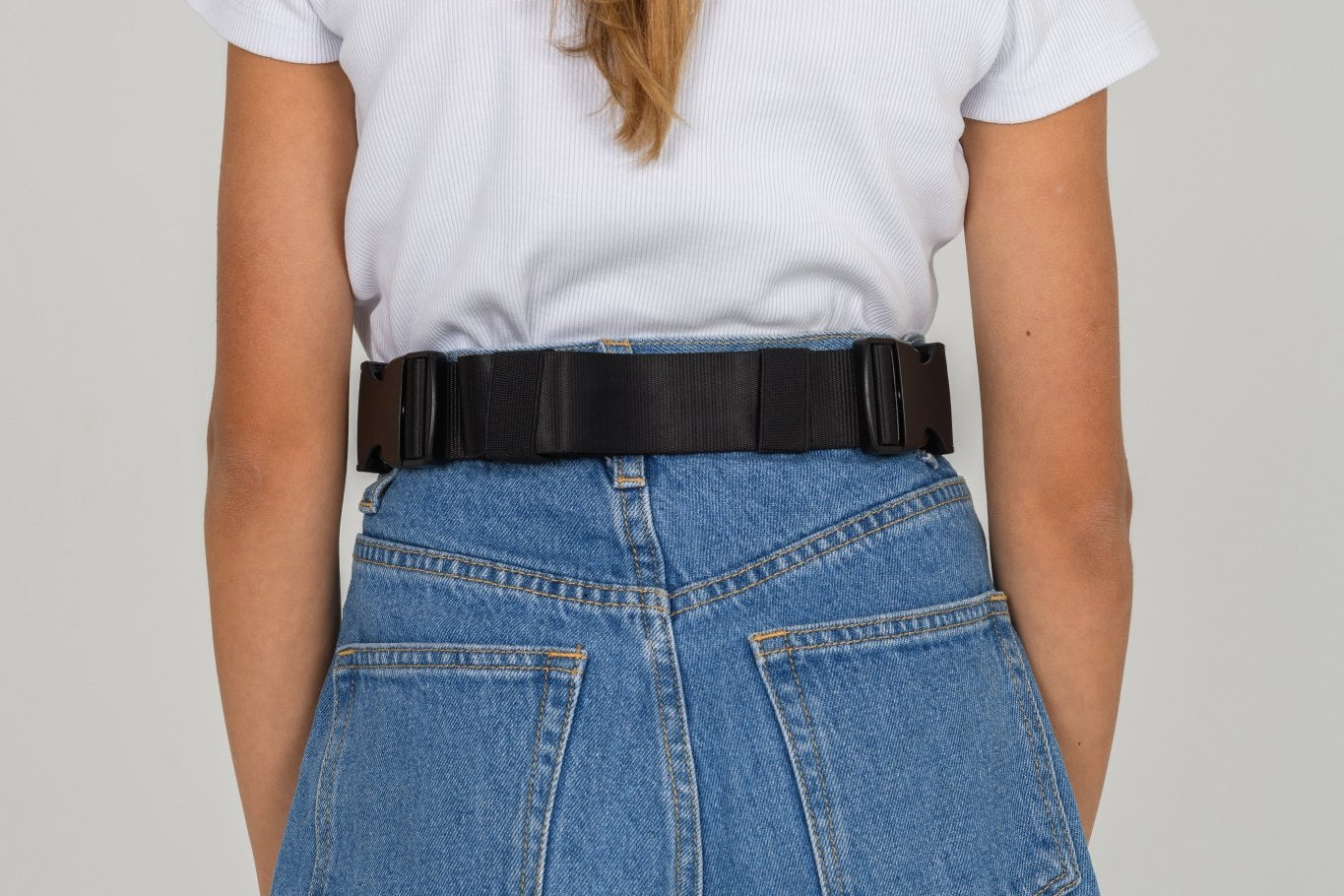 Black Med Ready Bag worn as a waist bag - back view.