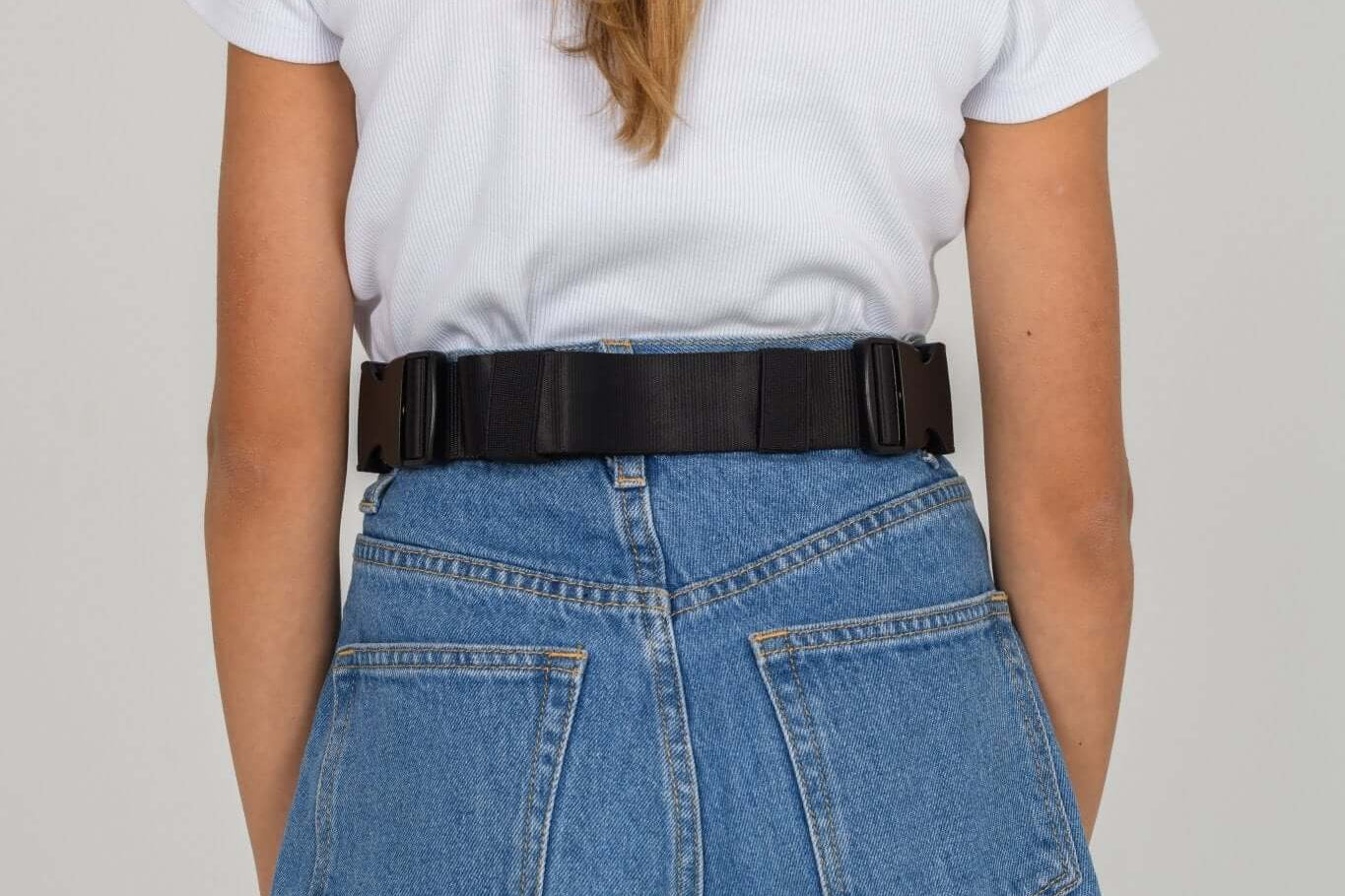 Black Med Ready Bag worn as a waist bag - back view.