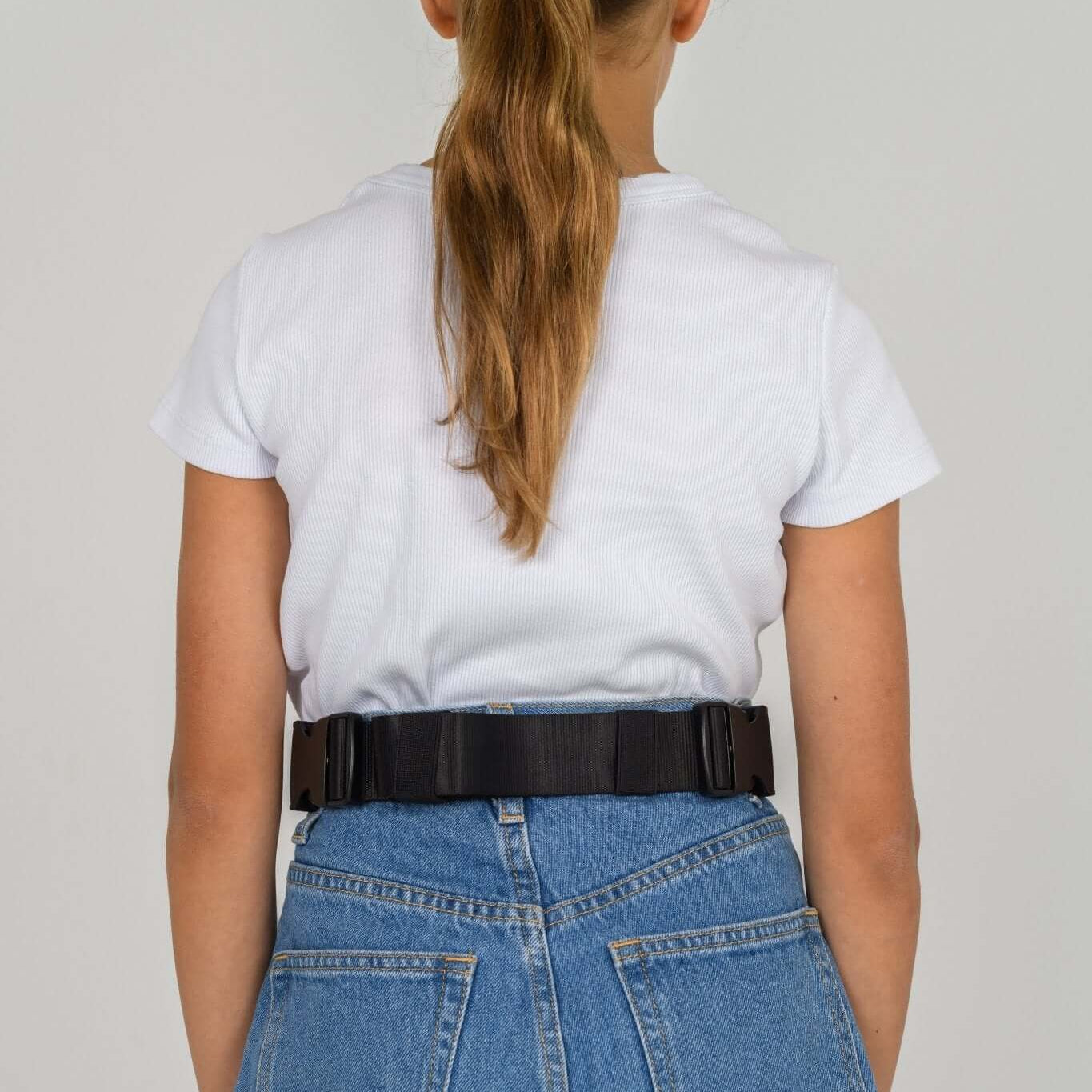 Black Med Ready Bag worn as a waist bag - back view.