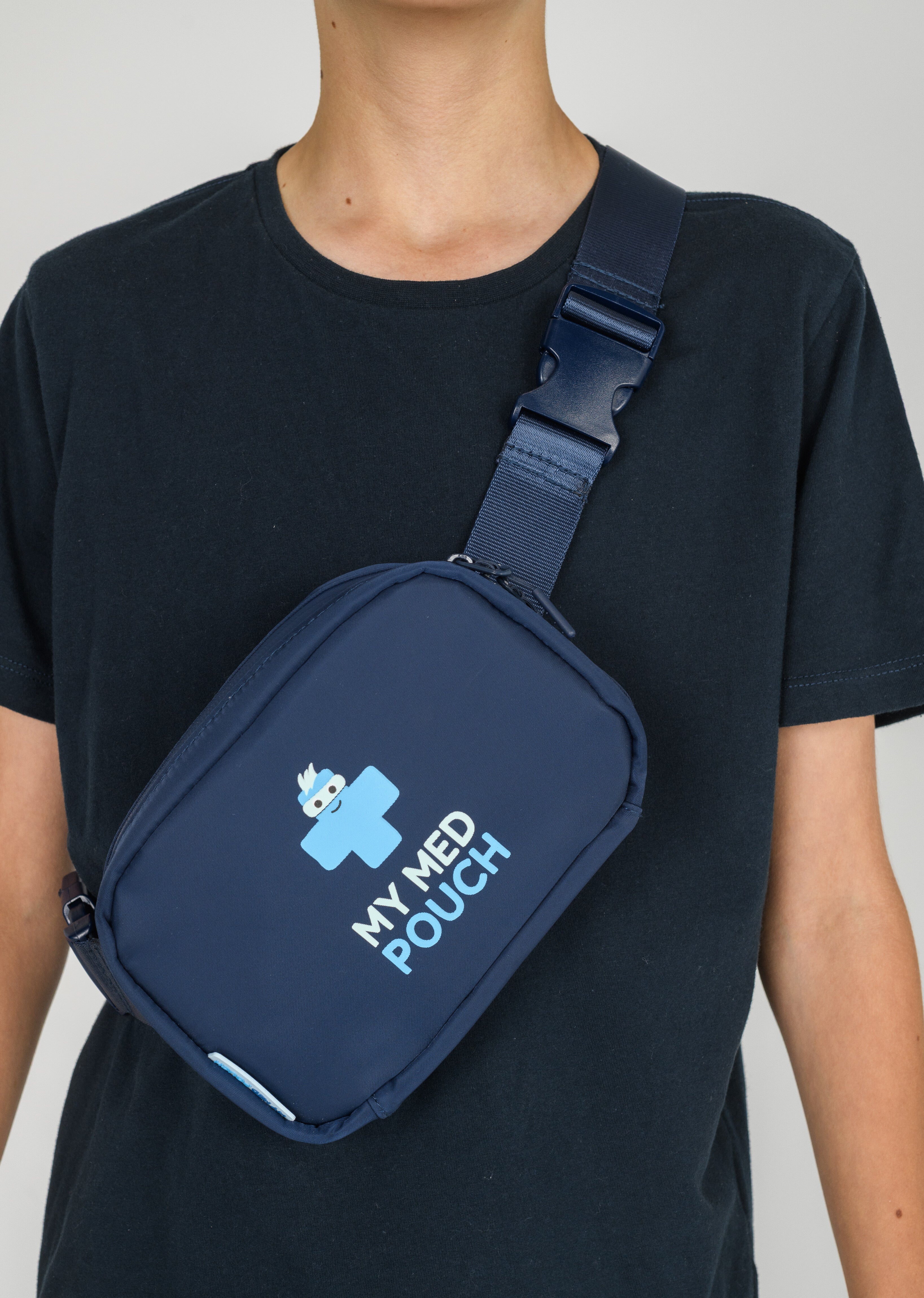 Child wearing navy Med Ready Bag as a shoulder sling